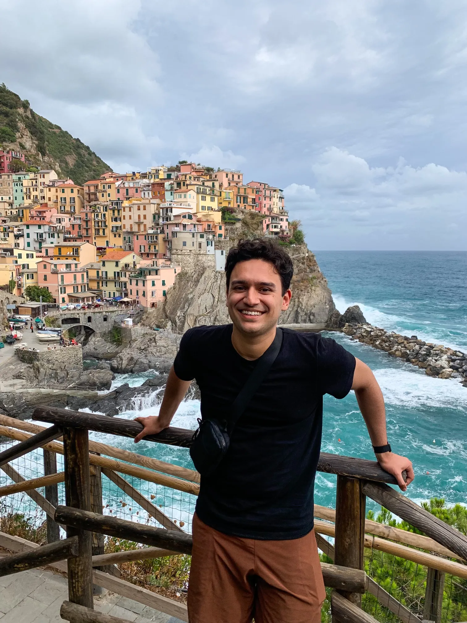 Charlye Castro smiling in Cinque Terre, Italy